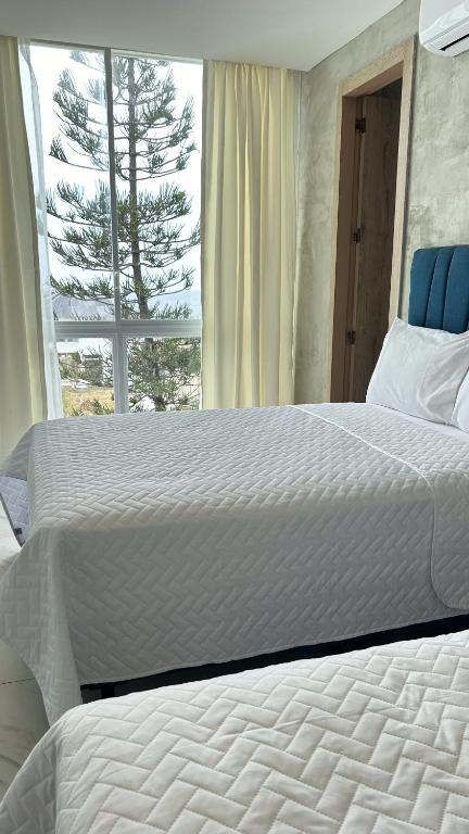 Postel nebo postele na pokoji v ubytování Hotel Presidente Beach Playas