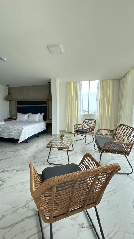 Postel nebo postele na pokoji v ubytování Hotel Presidente Beach Playas
