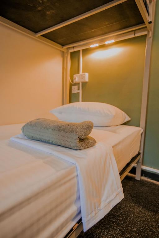 Postel nebo postele na pokoji v ubytování Drop Inn Hostels