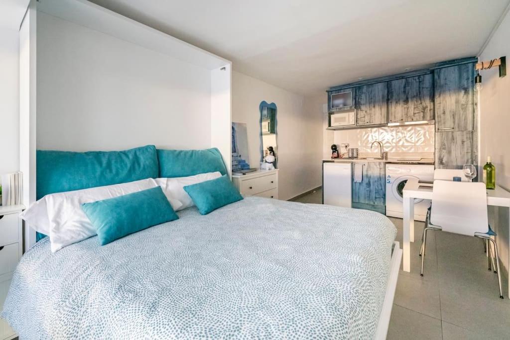 Postel nebo postele na pokoji v ubytování Loft beach blue