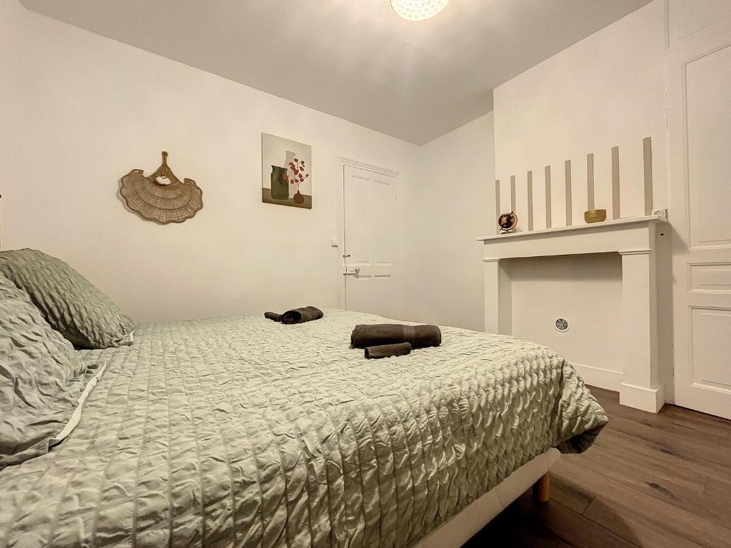 Posteľ alebo postele v izbe v ubytovaní Coeur de ville, T2 cosy & élégant
