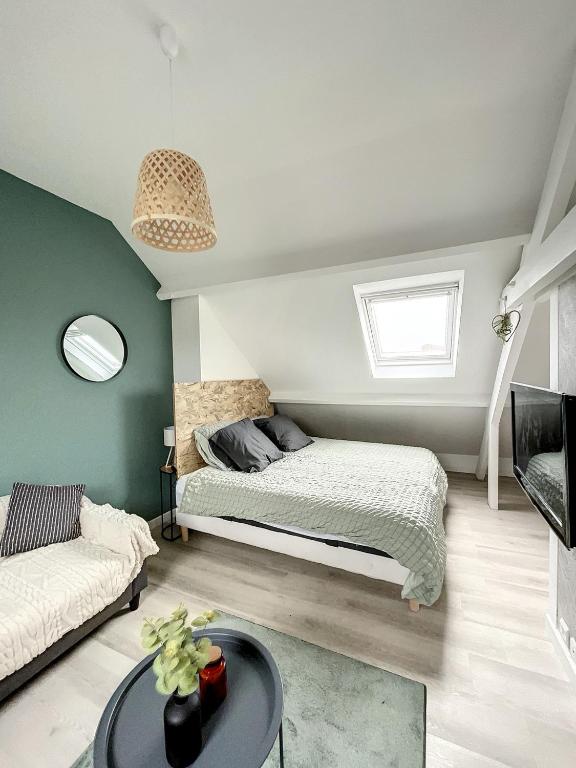 Posteľ alebo postele v izbe v ubytovaní Coeur de ville, T2 cosy & élégant