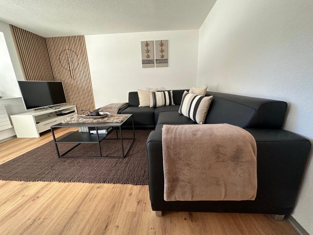 TV a/nebo společenská místnost v ubytování Apartment Enzian