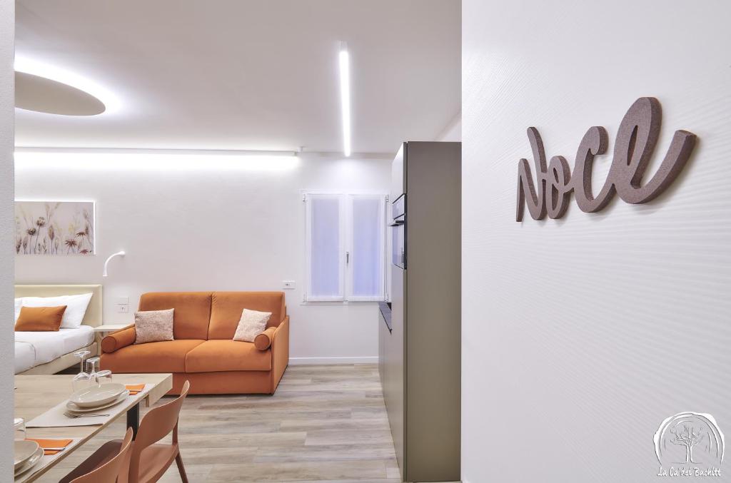 Een zitgedeelte bij FORESTERIA GUESTHOUSE CA' DEI BACHITT