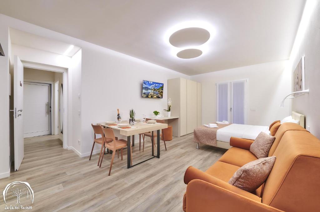 Een zitgedeelte bij FORESTERIA GUESTHOUSE CA' DEI BACHITT