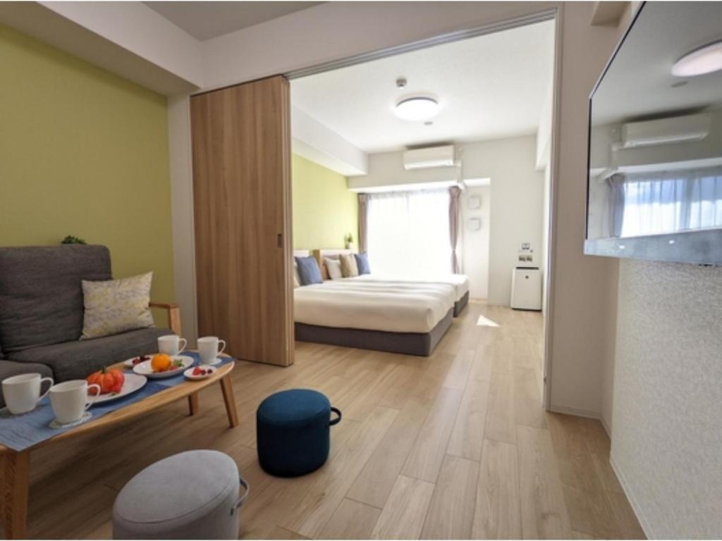 Giường trong phòng chung tại Eslead Hotel Namba South III - Vacation STAY 39771v