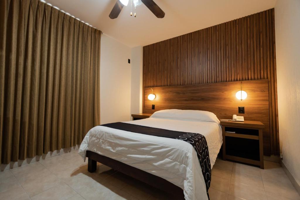 Postel nebo postele na pokoji v ubytování Hotel HC