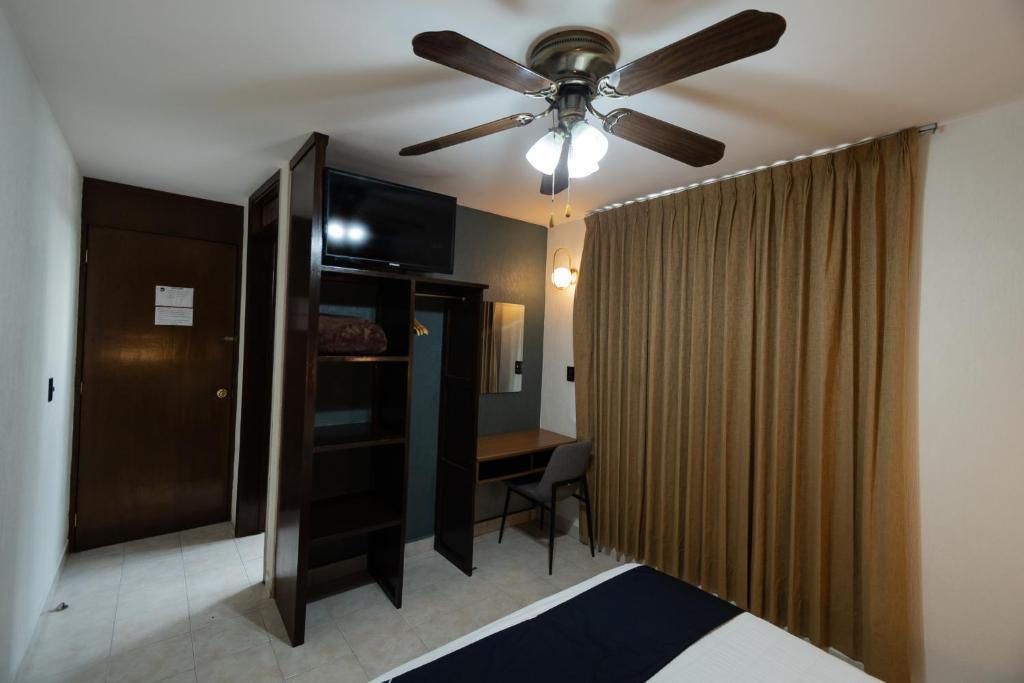 Postel nebo postele na pokoji v ubytování Hotel HC