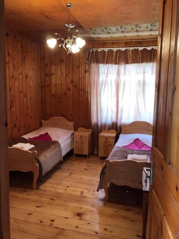 Postel nebo postele na pokoji v ubytování ELISO'S GUESTHOUSE