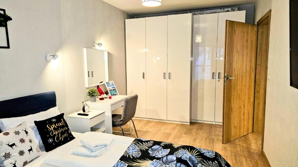 Posedenie v ubytovaní Apartament z pięknym widokiem na las
