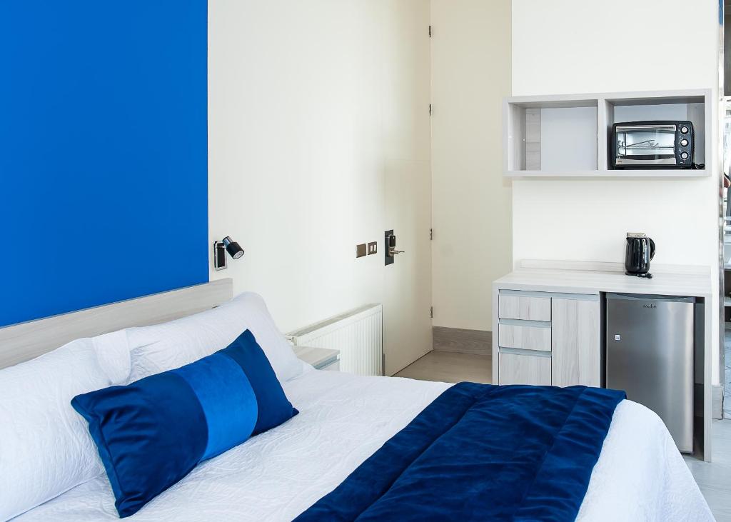 Postel nebo postele na pokoji v ubytování Casa Esmeralda