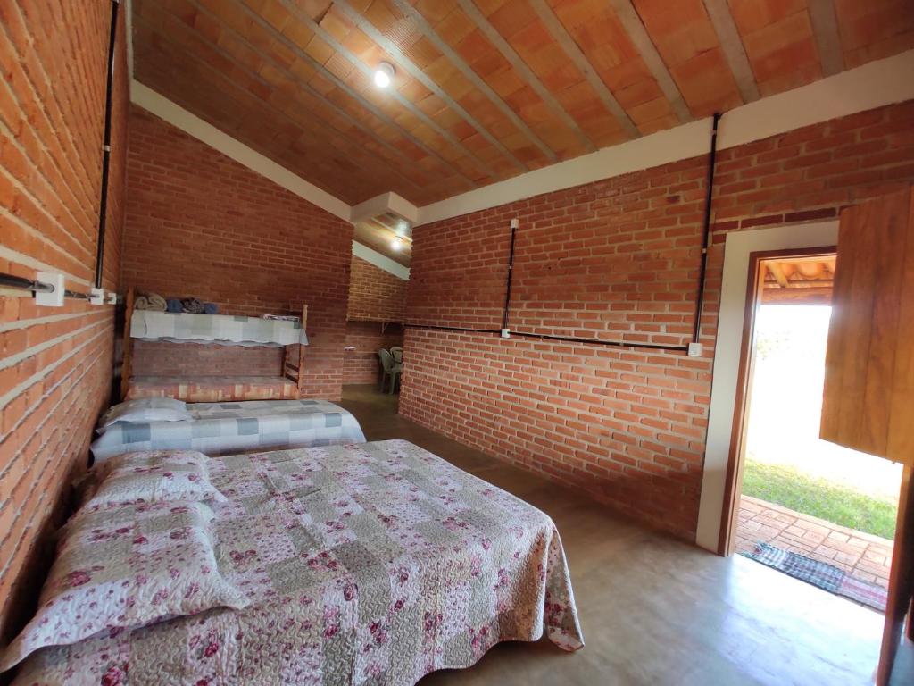 Postel nebo postele na pokoji v ubytování Pousada do Chicó