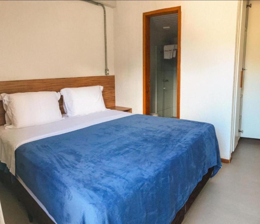 Voodi või voodid majutusasutuse Apartamento com garagem no Centro de Guaramiranga toas