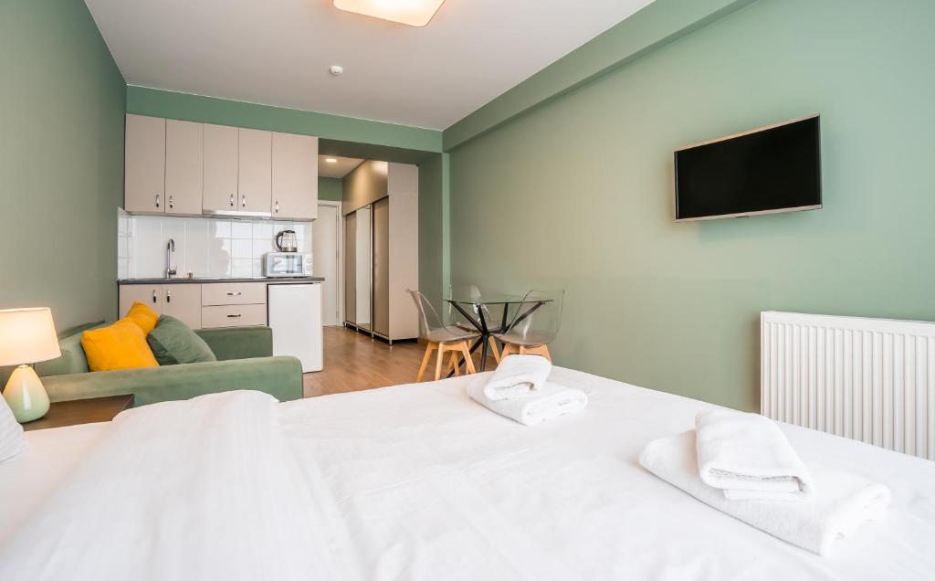 Postel nebo postele na pokoji v ubytování Studio Apartment NFT New Gudauri 503