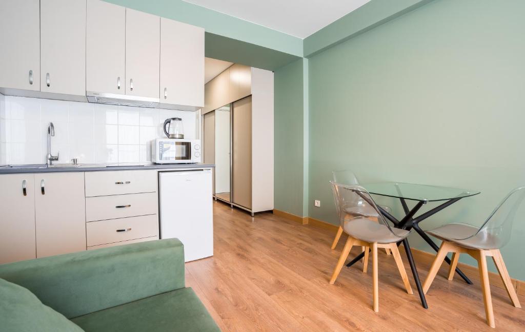 Kuchyň nebo kuchyňský kout v ubytování Studio Apartment NFT New Gudauri 503