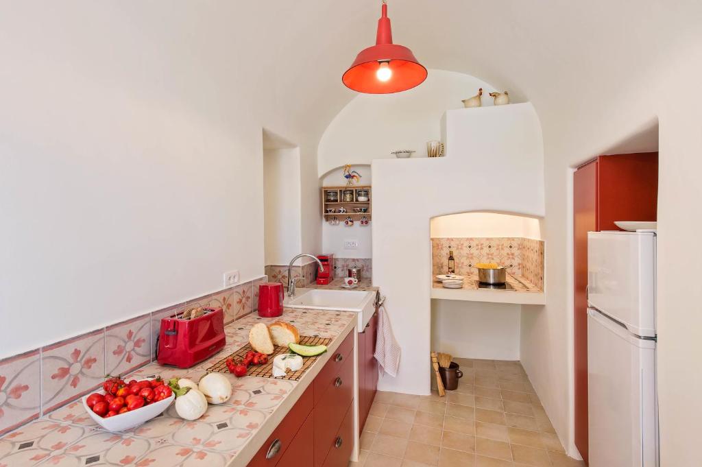 Kuchyň nebo kuchyňský kout v ubytování Mantilida Villa