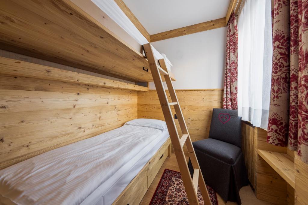 Łóżko lub łóżka w pokoju w obiekcie Hotel Columbia & Spa