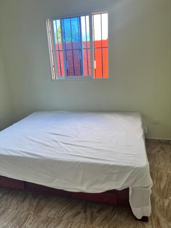 Кровать или кровати в номере Residencial Peralta