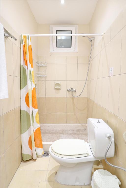 Koupelna v ubytování Louiza Apartments