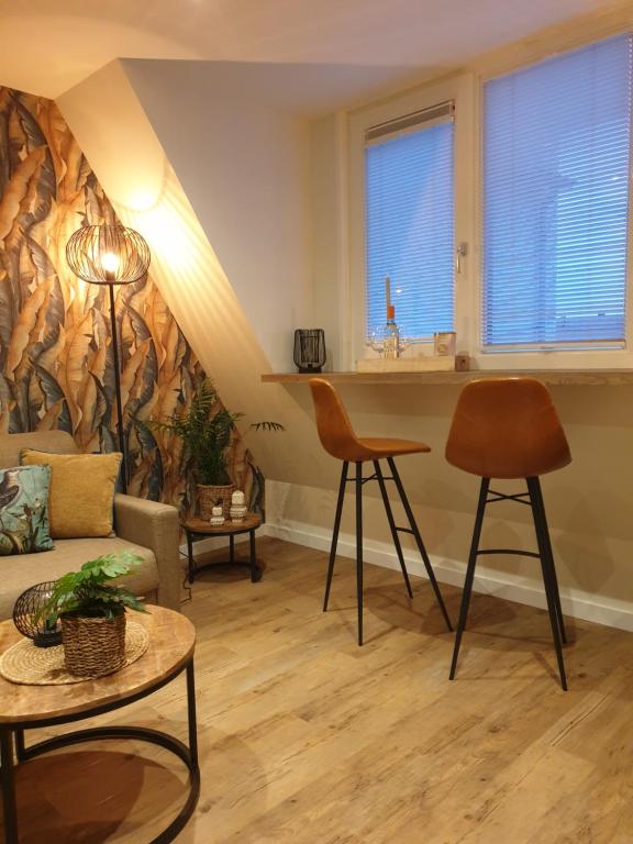 Posezení v ubytování Suite De Brinkparel