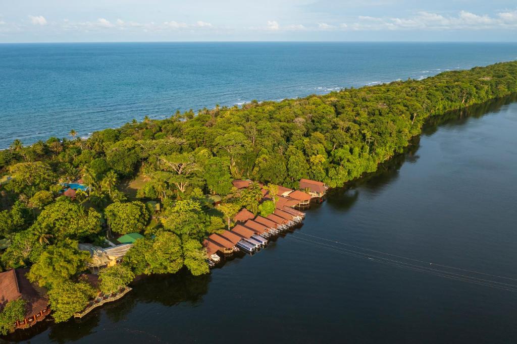 an aerial view of an island in the water at Laguna Lodge in Tortuguero