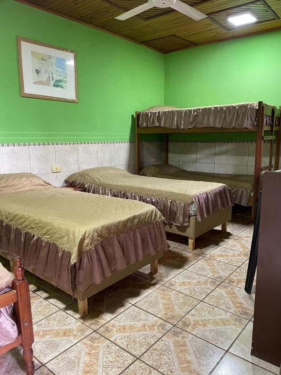 Postel nebo postele na pokoji v ubytování Residencial Arcoiris