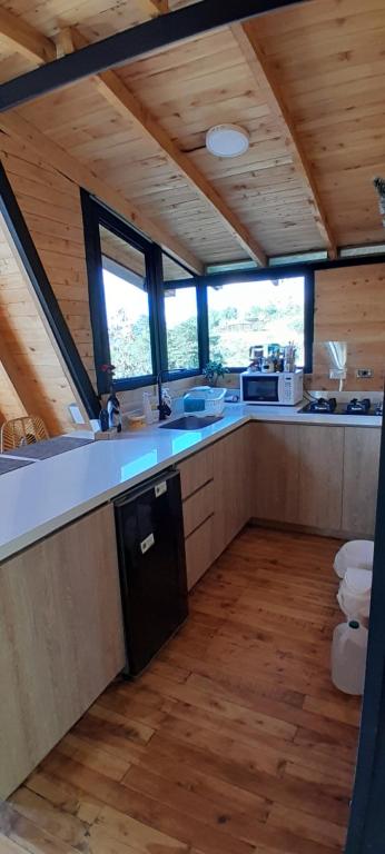 Kuchyň nebo kuchyňský kout v ubytování Cabaña Starka & Jacuzzi