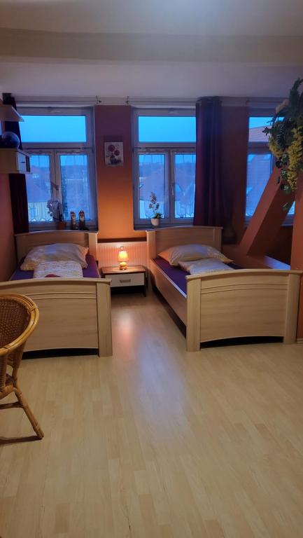 Postel nebo postele na pokoji v ubytování Gasthaus Pavillon