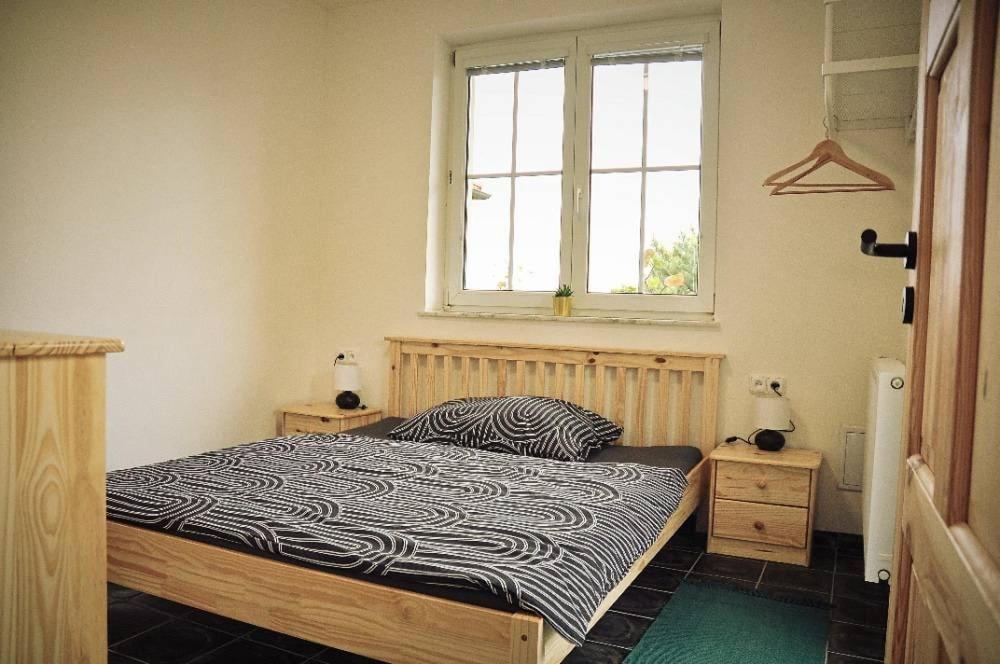 Postel nebo postele na pokoji v ubytování U božích muk