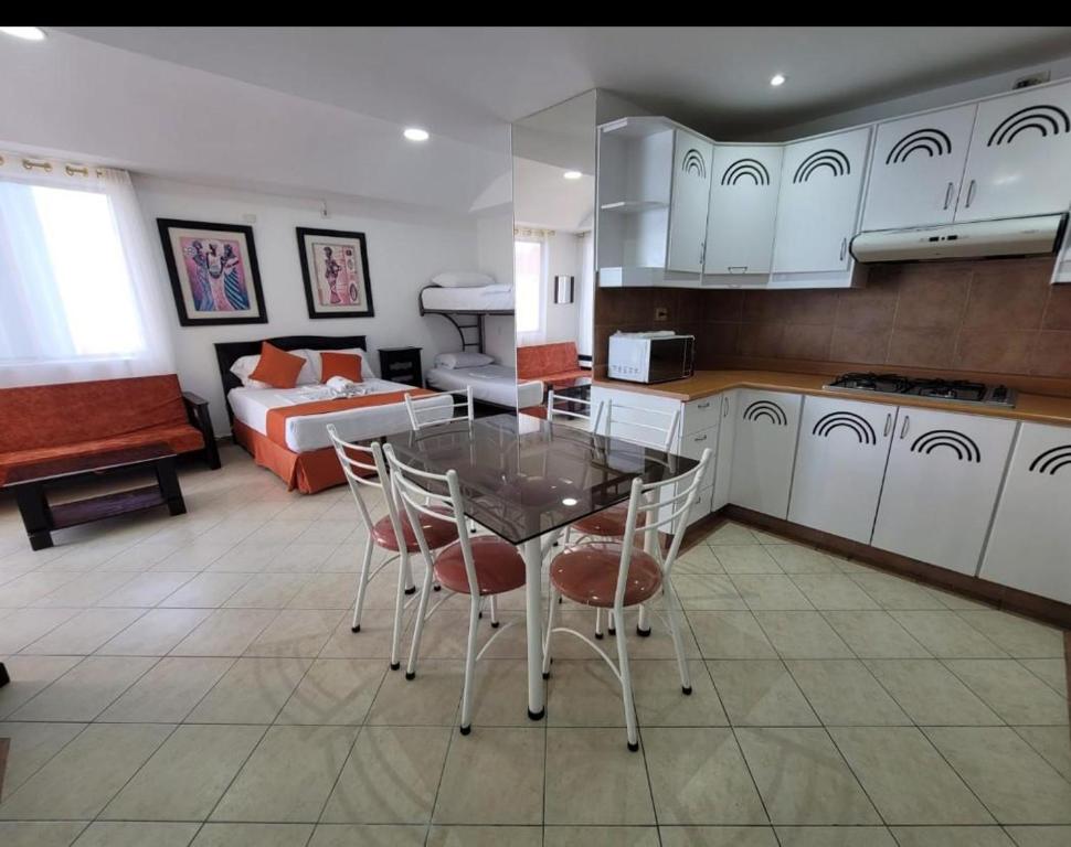 Kuchyň nebo kuchyňský kout v ubytování Hotel Arco Iris