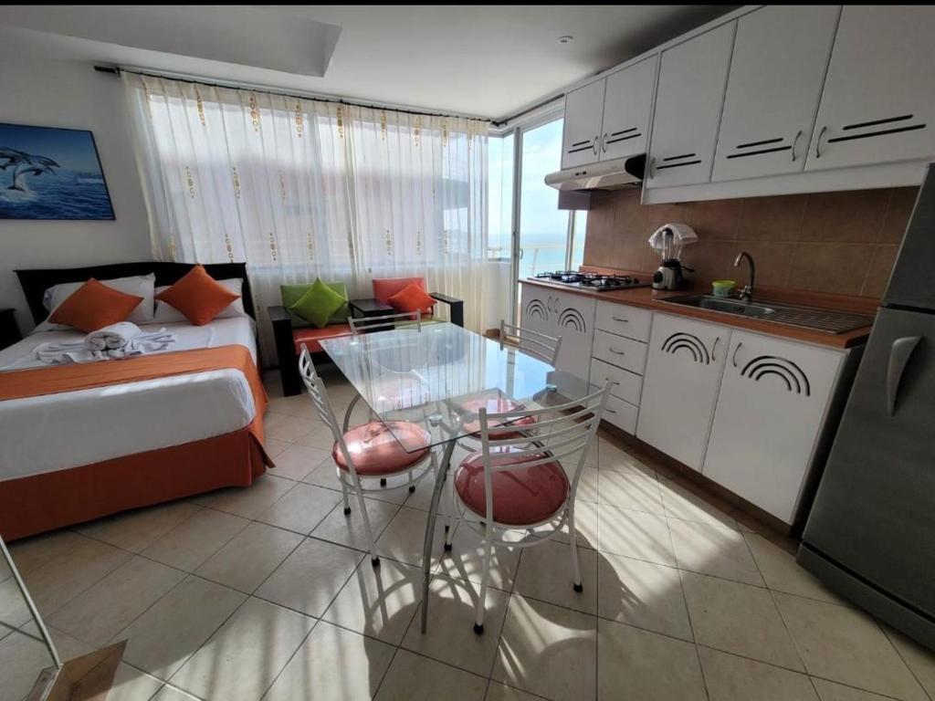 Kuchyň nebo kuchyňský kout v ubytování Hotel Arco Iris