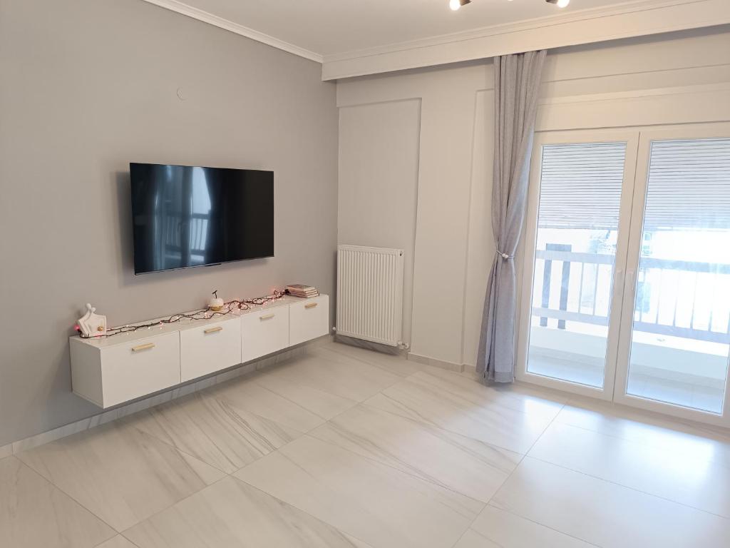 Comfort Corner 75m2 100Mbs tesisinde bir televizyon ve/veya eğlence merkezi