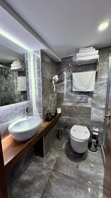 Koupelna v ubytování Snog Rooms & Suites