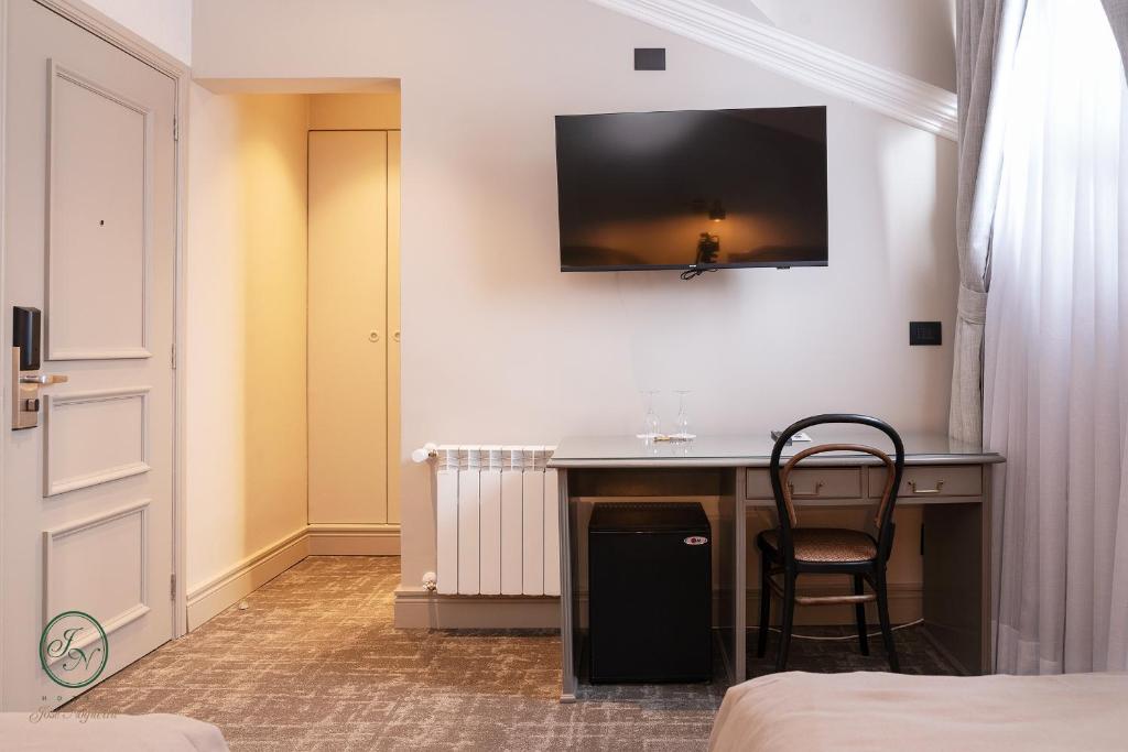 TV a/nebo společenská místnost v ubytování Hotel José Nogueira