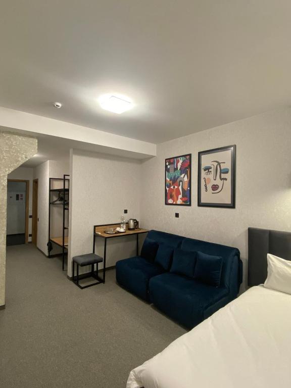 Postel nebo postele na pokoji v ubytování VATRA HOTEL