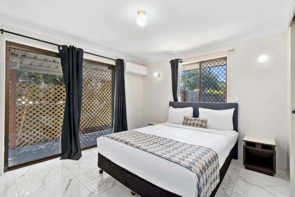 Postel nebo postele na pokoji v ubytování Econo Lodge Waterford