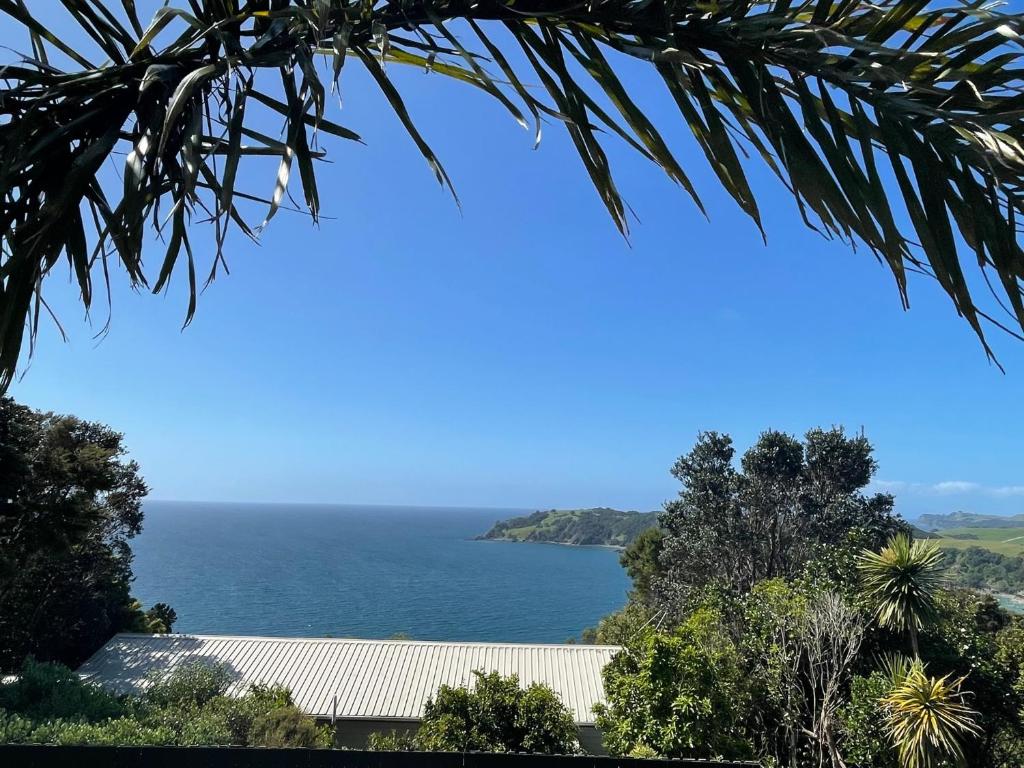 a view of the ocean from a tree at The Jazz Loft in Onetangi