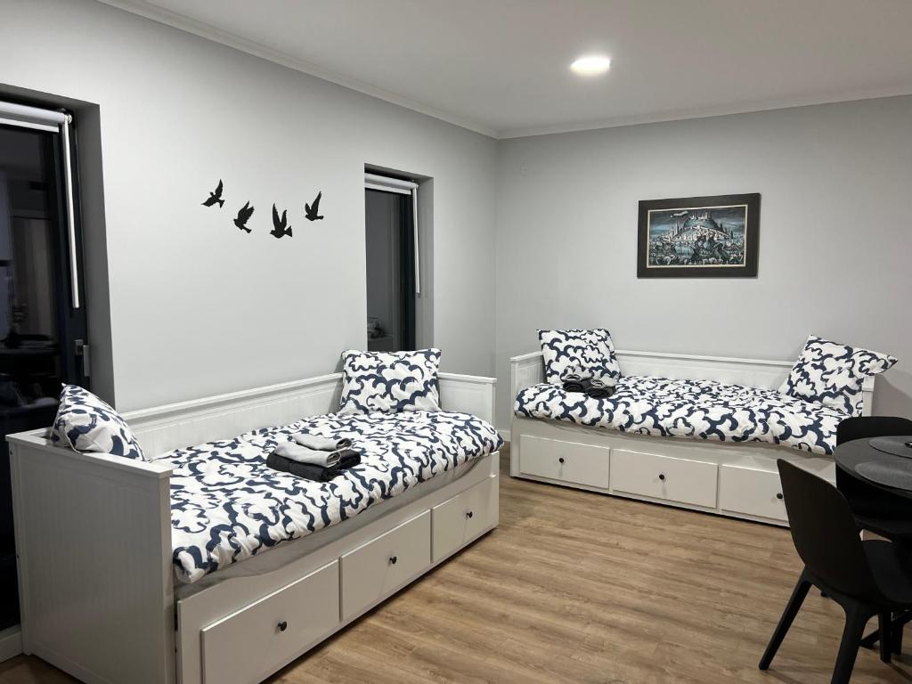 Postel nebo postele na pokoji v ubytování Planinska Princeza Apartmani