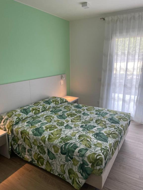 Postel nebo postele na pokoji v ubytování Il Fiore del lago