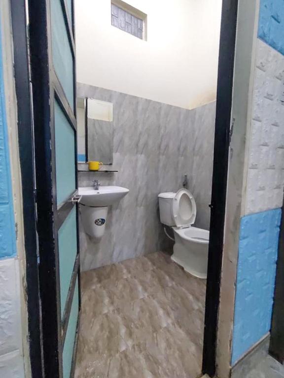 Koupelna v ubytování Homestay Vườn nhãn