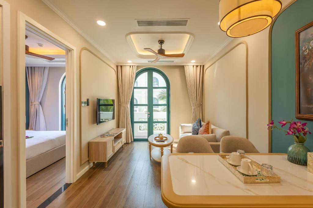 Giường trong phòng chung tại Stella Marina Boutique Hotel