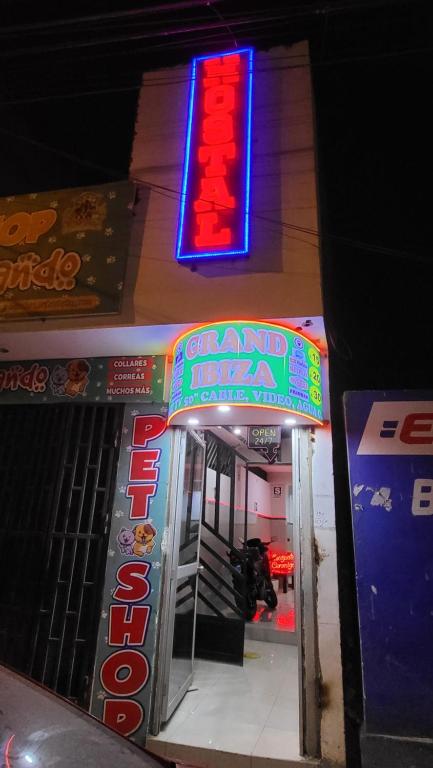 a video game arcade with a sign above a door at HOSTAL GRAND IBIZA in Huacho