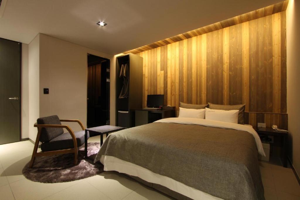 Postel nebo postele na pokoji v ubytování Boutique Hotel K-Oido