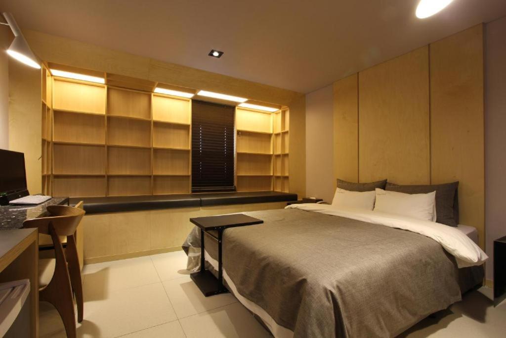 Postel nebo postele na pokoji v ubytování Boutique Hotel K-Oido