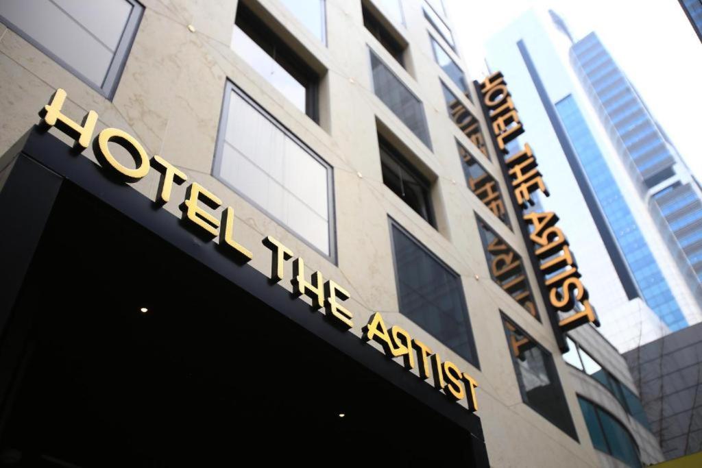 a hotel sign on the front of a building at Hotel The Artist Yeoksam in Seoul