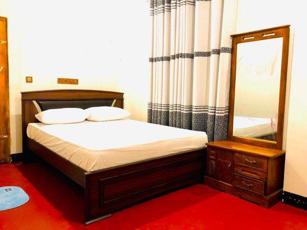 Postel nebo postele na pokoji v ubytování R & D Resort