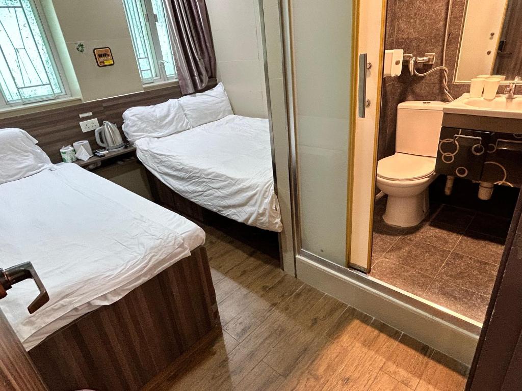 Koupelna v ubytování 香港星星旅馆 2202 Guesthouse