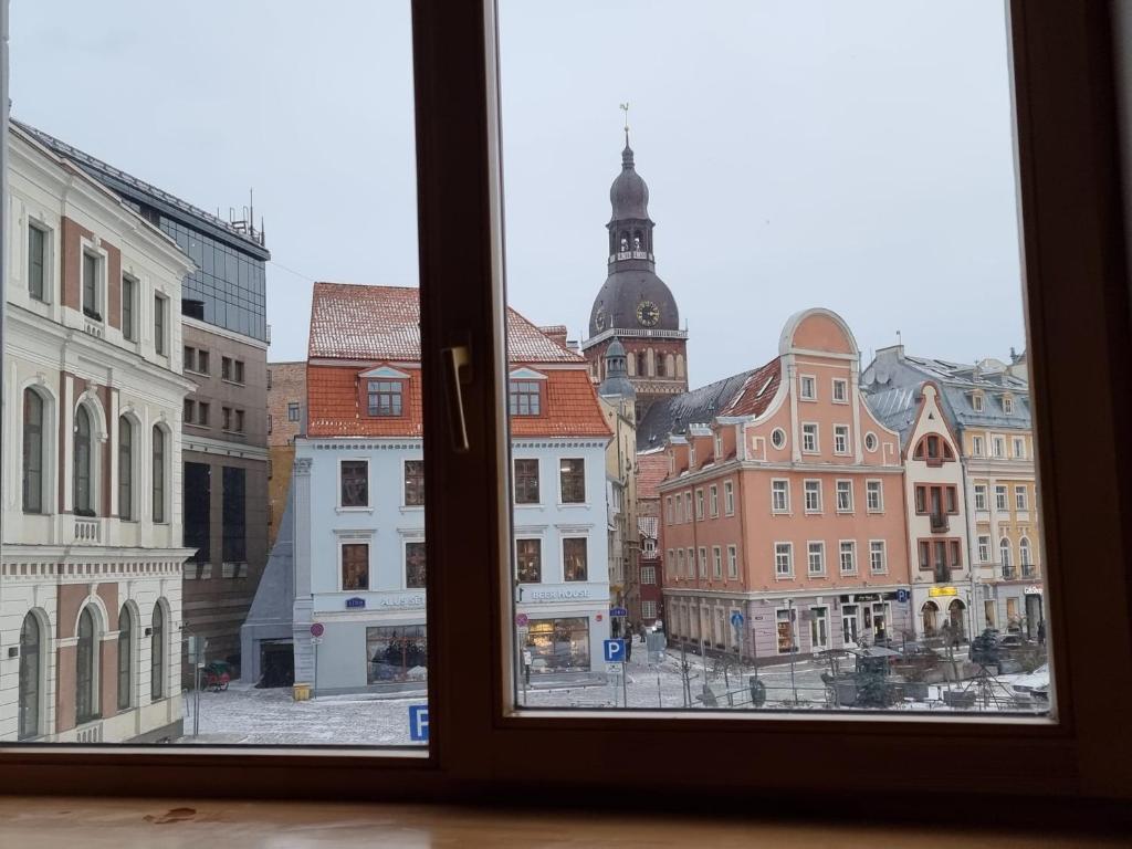 a view of a city from a window at City Inn 2 Bedroom Apartment next to City Hall with parking in Rīga