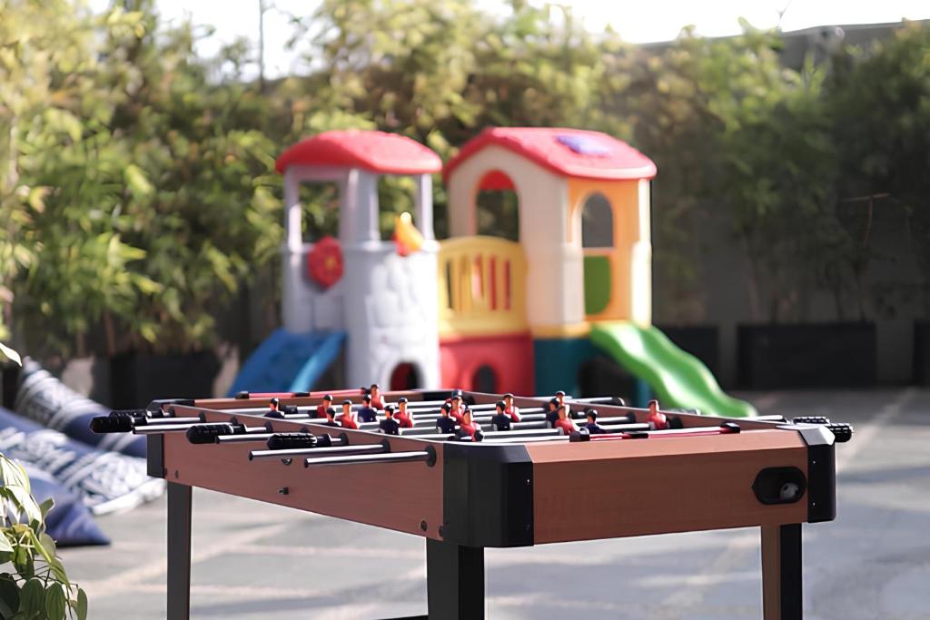 a toy chessboard in front of a playground at Golden Tulip Springhill Lampung in Bandar Lampung