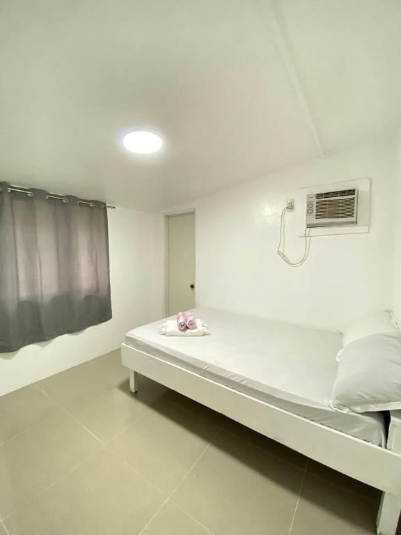 Ένα ή περισσότερα κρεβάτια σε δωμάτιο στο Casa Luna 2 Bedroom House